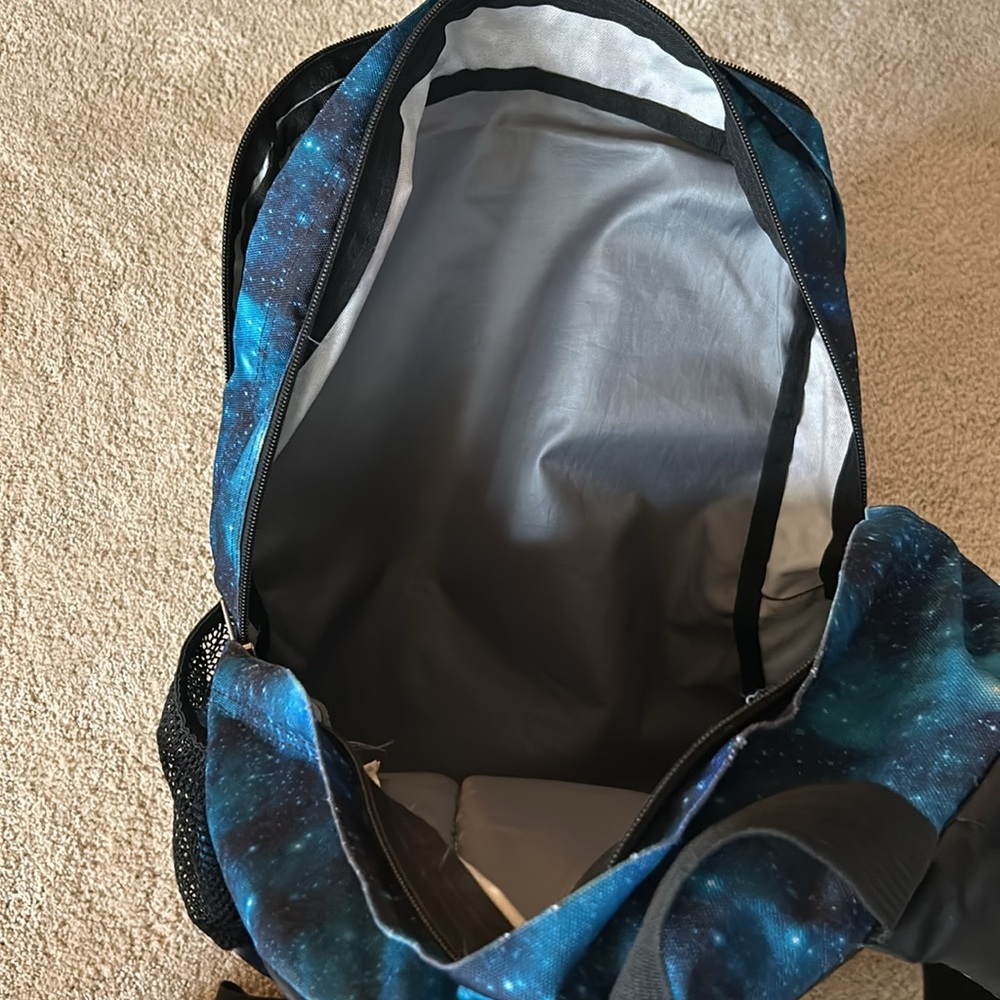 Backpack with multiple packets. - Picture 3 of 3